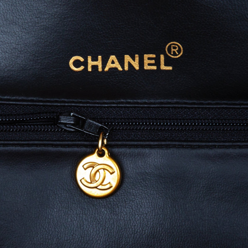 Chanel Vinyl Quilted Jumbo Travel Logo Bag